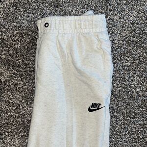 Nike white sweat pants.